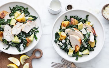Kale Caesar Salad with Roasted Chicken and Crispy Potatoes